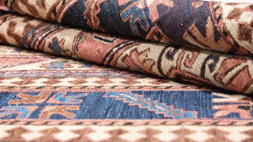Close-up detail of New Sumakh rug from Iran / Persia showing Wool weave