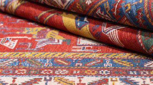 Close-up detail of New Sumakh rug from Iran / Persia showing Wool weave