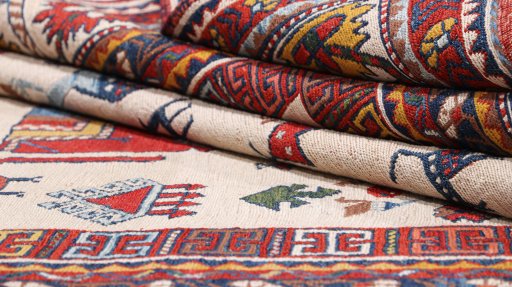 Close-up detail of New Sumakh rug from Iran / Persia showing Wool weave