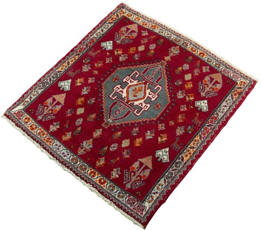 Corner detail of 2000s Shiraz rug showing border pattern and Wool pile