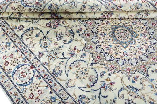 Close-up detail of 2000s Nain rug from Iran / Persia showing Wool weave