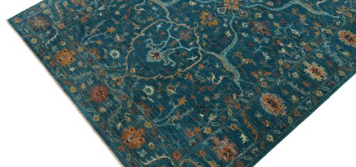 Backside of handmade New Farahan rug showing knot structure and weave density