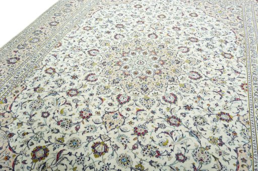 Backside of handmade 2000s Kashan rug showing knot structure and weave density