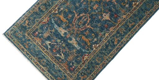 Backside of handmade New Farahan rug showing knot structure and weave density