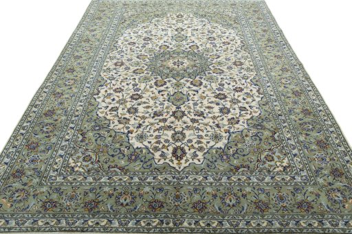 Surface texture of 2000s Kashan rug with natural Wool and intricate pattern