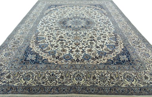 Surface texture of 2000s Nain rug with natural Wool and intricate pattern