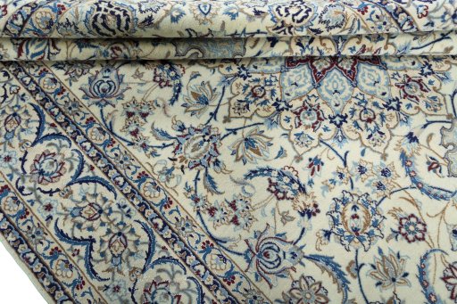 Close-up detail of 2000s Nain rug from Iran / Persia showing Wool weave