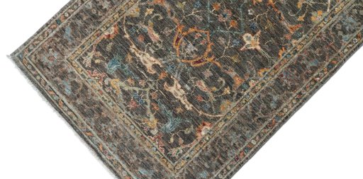 Backside of handmade New Farahan rug showing knot structure and weave density