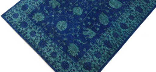 Backside of handmade New Farahan rug showing knot structure and weave density