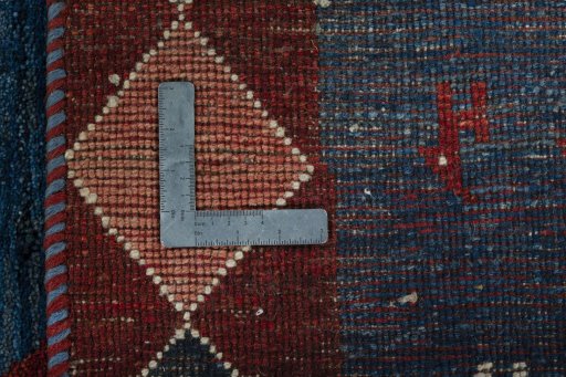 Close-up detail of 2000s Persian Gabbeh rug from Pakistan showing Wool weave