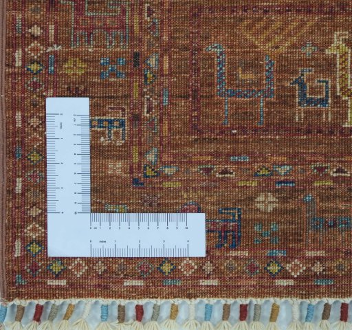 Corner detail of New Samarkand rug showing border pattern and Wool pile