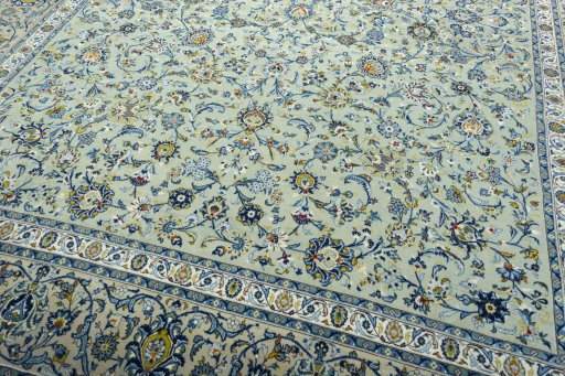 Close-up detail of 2000s Kashan rug from Iran / Persia showing Wool weave