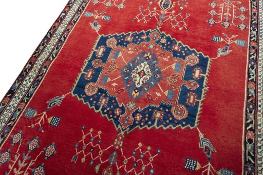 Backside of handmade 2000s Sirjan rug showing knot structure and weave density