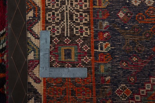 Surface texture of 1970s Shiraz rug with natural Wool and intricate pattern