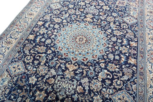Backside of handmade 2000s Nain rug showing knot structure and weave density