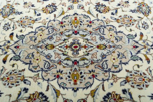 Central medallion detail of 2000s Kashan rug from Iran / Persia
