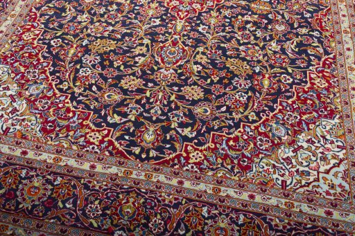 Close-up detail of 2000s Kashan rug from Iran / Persia showing Wool weave