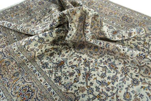 Surface texture of 2000s Kashan rug with natural Wool and intricate pattern