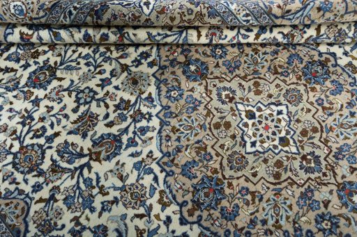 Close-up detail of 2000s Kashan rug from Iran / Persia showing Wool weave