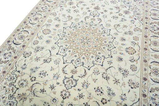 Backside of handmade 2000s Nain rug showing knot structure and weave density