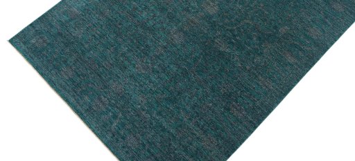 Backside of handmade New Farahan rug showing knot structure and weave density