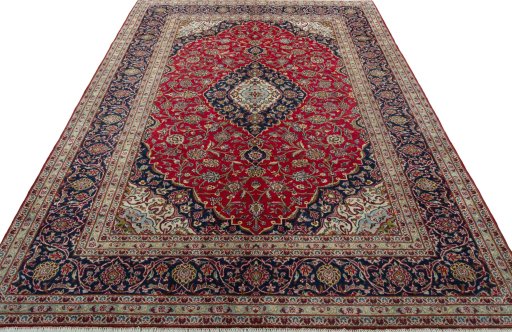 Surface texture of 2000s Kashan rug with natural Wool and intricate pattern