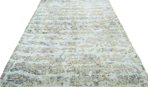Surface texture of 1950s Vintage rug with natural Wool and intricate pattern