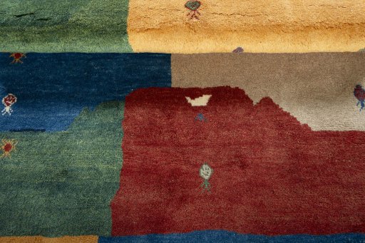 Full view of 2000s Persian Gabbeh rug from Pakistan, 187 × 130 cm in Multi Color tones