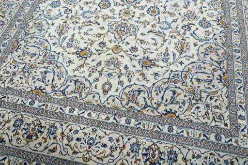 Close-up detail of 2000s Kashan rug from Iran / Persia showing Wool weave
