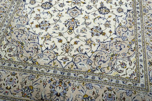 Close-up detail of 2000s Kashan rug from Iran / Persia showing Wool weave