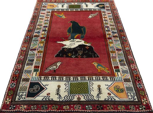 Surface texture of 2000s Persian Gabbeh rug with natural Wool and intricate pattern