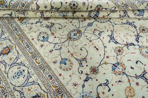 Close-up detail of 2000s Kashan rug from Iran / Persia showing Wool weave