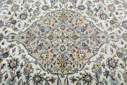 Central medallion detail of 2000s Kashan rug from Iran / Persia