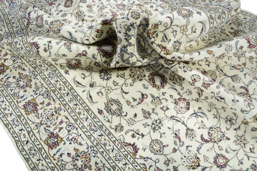 Surface texture of 2000s Kashan rug with natural Wool and intricate pattern