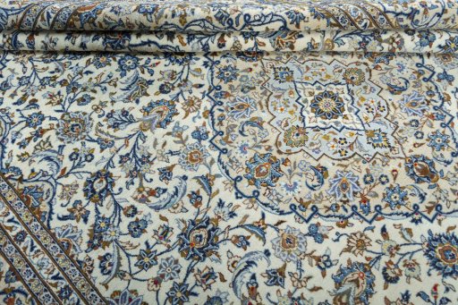 Close-up detail of 2000s Kashan rug from Iran / Persia showing Wool weave