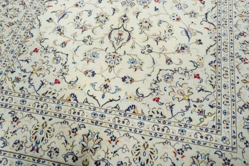 Close-up detail of 2000s Kashan rug from Iran / Persia showing Wool weave