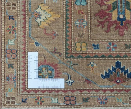 Corner detail of New Kazak rug showing border pattern and Wool pile