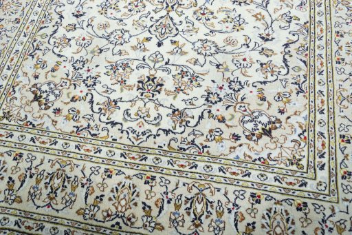 Close-up detail of 2000s Kashan rug from Iran / Persia showing Wool weave