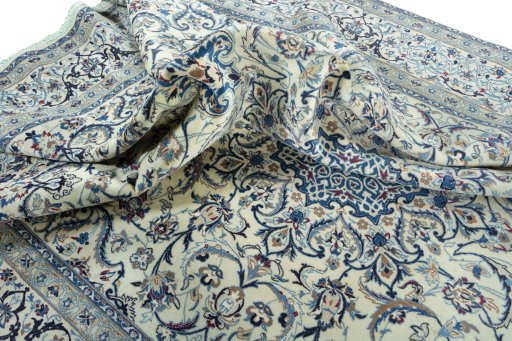 Surface texture of 2000s Nain rug with natural Wool and intricate pattern