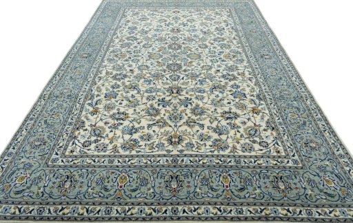 Surface texture of 2000s Kashan rug with natural Wool and intricate pattern