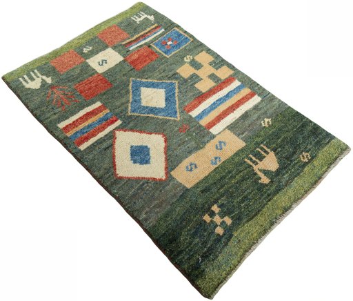 Close-up detail of 2000s Persian Gabbeh rug from Iran / Persia showing Wool weave