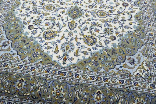 Close-up detail of 2000s Kashan rug from Iran / Persia showing Wool weave