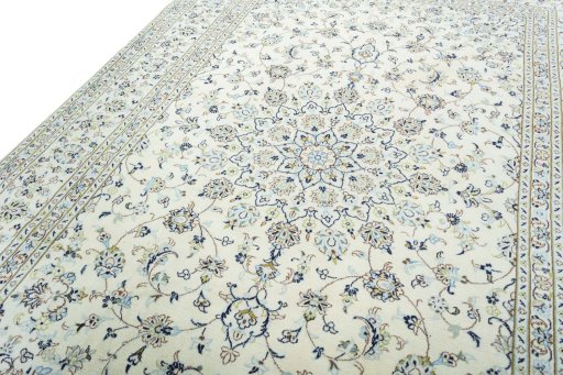 Backside of handmade New Kashan rug showing knot structure and weave density