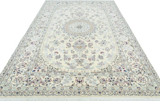 Surface texture of 2000s Nain rug with natural Wool and intricate pattern