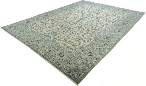 Corner detail of 2000s Kashan rug showing border pattern and Cork pile