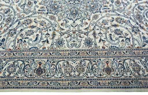 Corner detail of 2000s Kashmar rug showing border pattern and Wool pile
