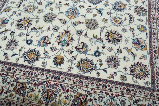 Close-up detail of 2000s Mashad rug from Iran / Persia showing Wool weave
