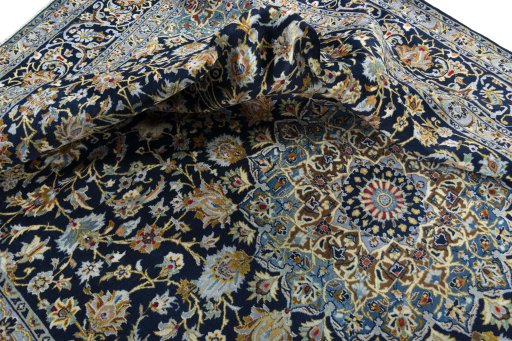 Surface texture of 2000s Kashan rug with natural Wool and intricate pattern