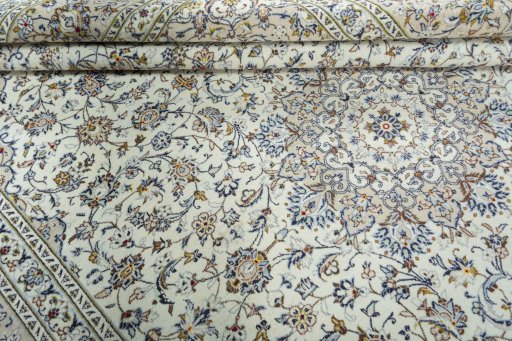 Close-up detail of 2000s Kashan rug from Iran / Persia showing Wool weave