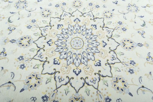 Central medallion detail of 2000s Kashan rug from Iran / Persia